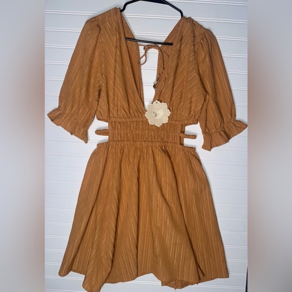 INDULGE IN STYLE Brown Striped Dress with Cutout Details